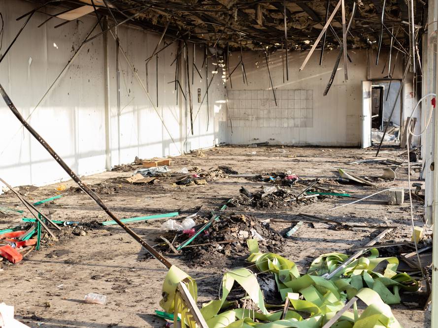Burned interiors after fire in an industrial or commercial building